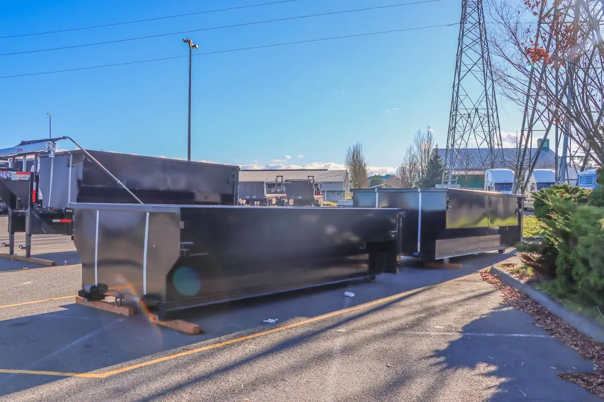 Roll-off dumpster ready for waste disposal at job site for 15 Yard Dumpster Rental in South Jordan